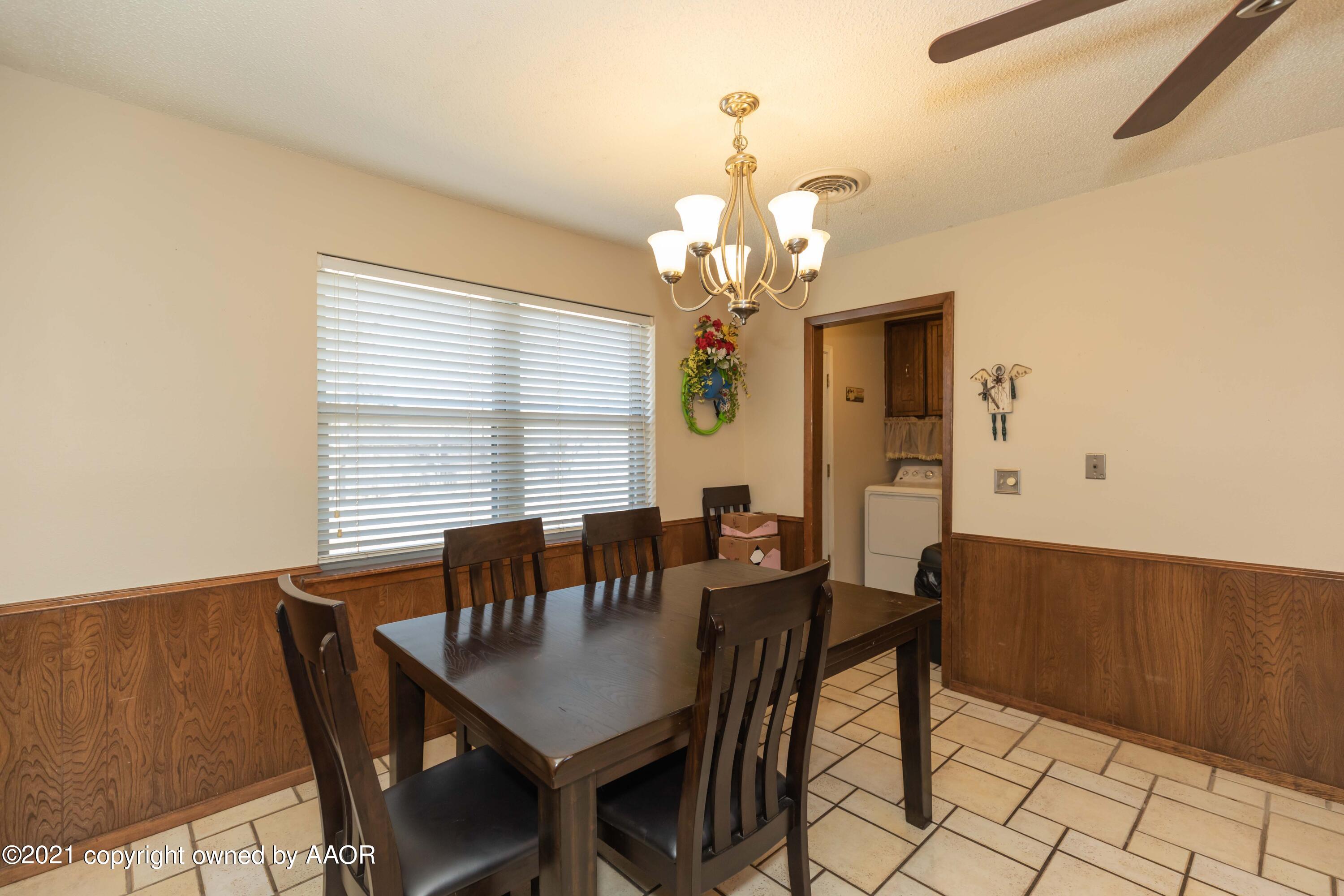 8100 Santa Fe Trail Amarillo, TX 79110 - Photo 14 of 35 a view of a dining room with furniture and window