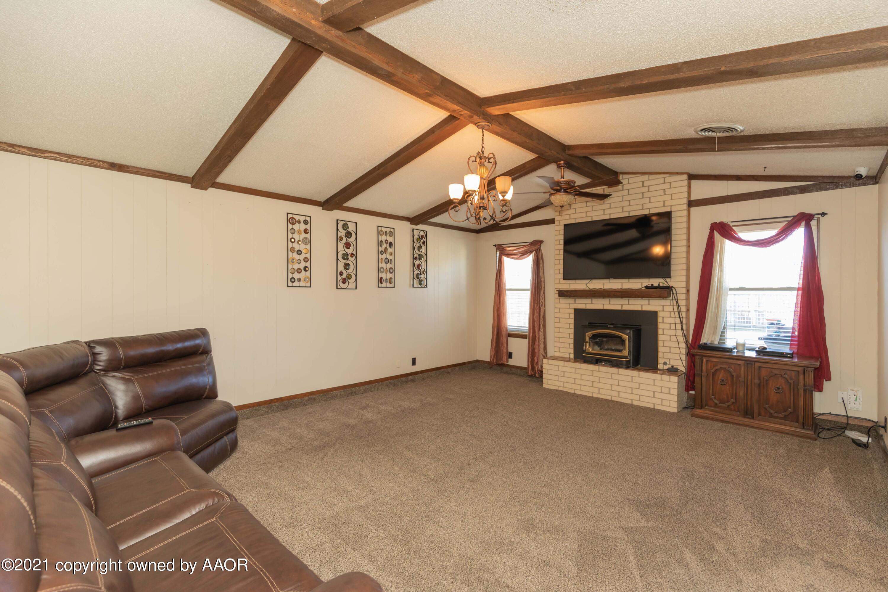 8100 Santa Fe Trail Amarillo, TX 79110 - Photo 6 of 35 a view of livingroom with furniture and fireplace