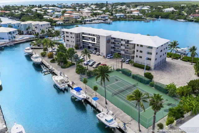 a view of a swimming pool with a lounge chair