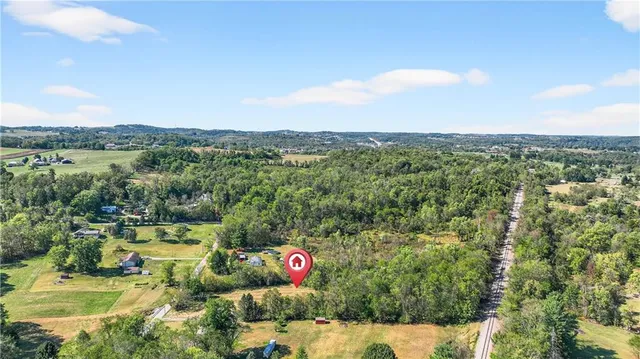 a view of lake with green space