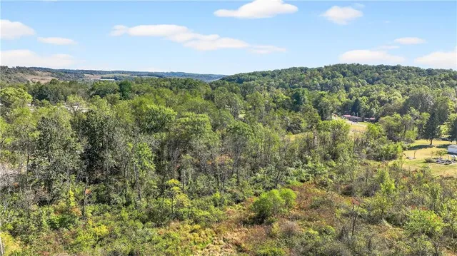 a view of a city and mountains in the background