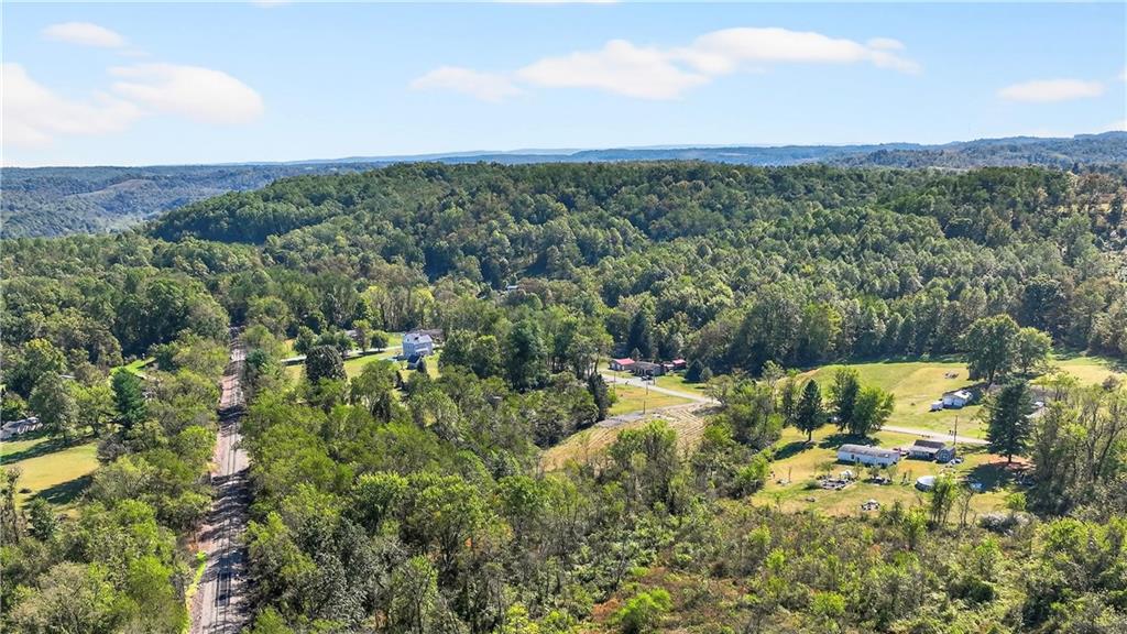 281 Porter Road Rostraver Township, PA 15012 - Photo 9 of 31 a view of a houses with a yard