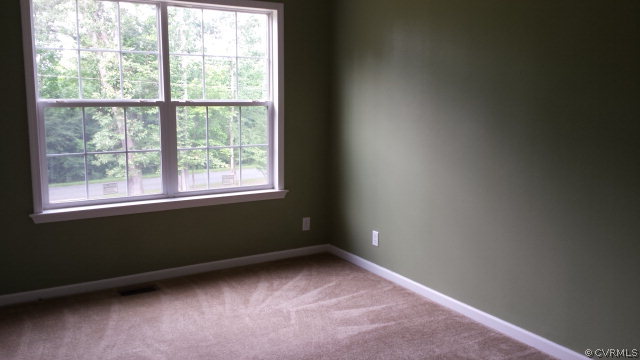 3814 Meherrin Road Meherrin, VA 23954 - Photo 12 of 15 an empty room with a window