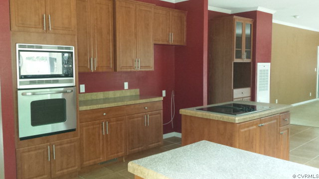 3814 Meherrin Road Meherrin, VA 23954 - Photo 8 of 15 a kitchen with cabinets and window