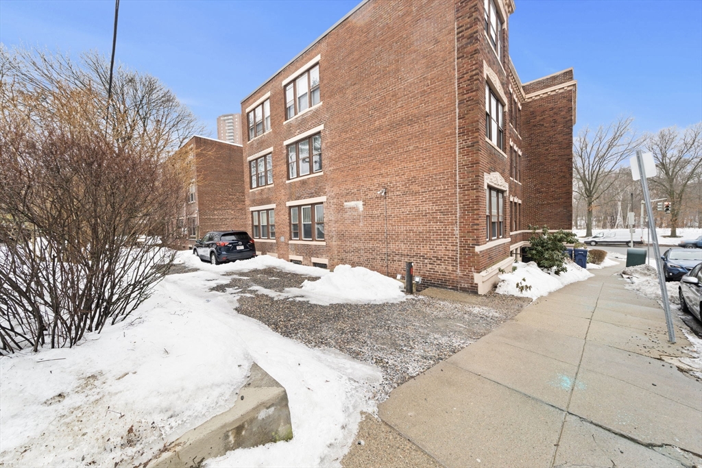 224 Jamaicaway, Unit 5 Boston, MA 02130 - Photo 14 of 15 a view of a street with a building