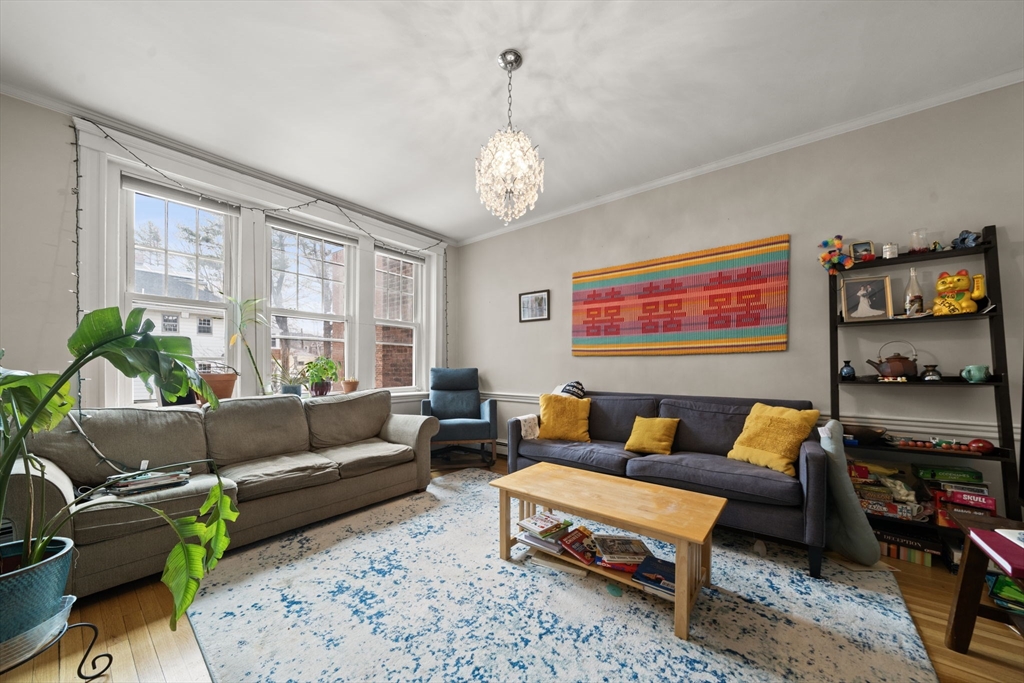 224 Jamaicaway, Unit 5 Boston, MA 02130 - Photo 2 of 15 a living room with furniture and a window