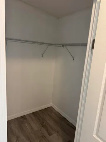a view of an empty walk in closet