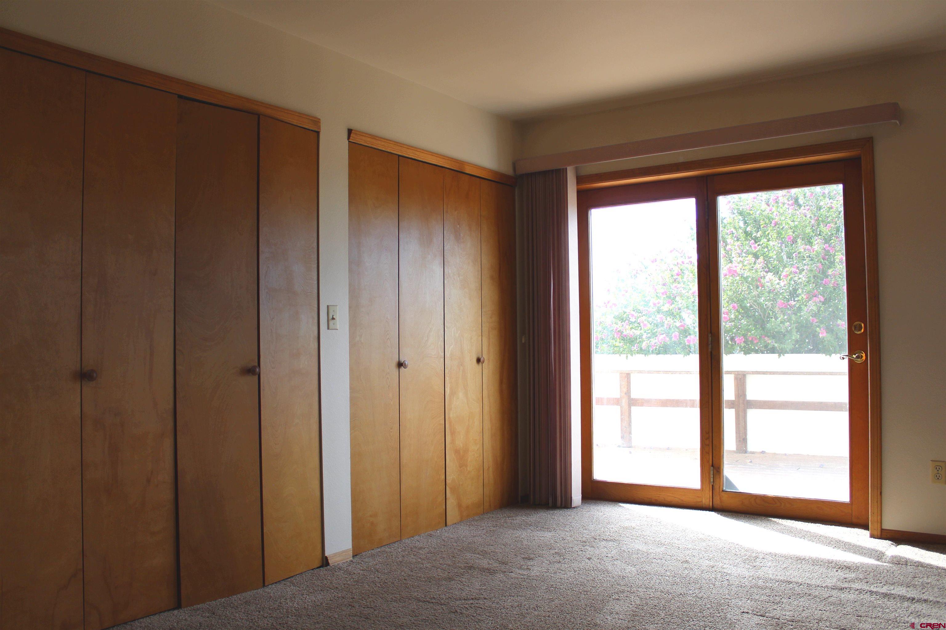 16754 Bull Mesa Road Cedaredge, CO 81413 - Photo 16 of 35 a view of empty room with front door