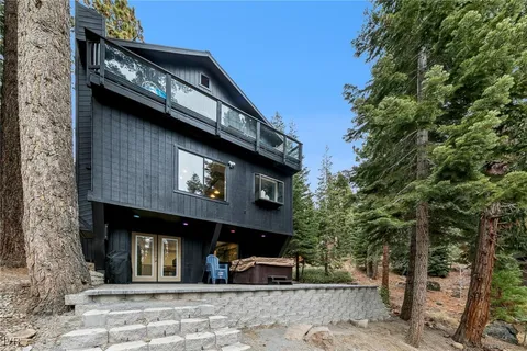 a front view of a house with parking