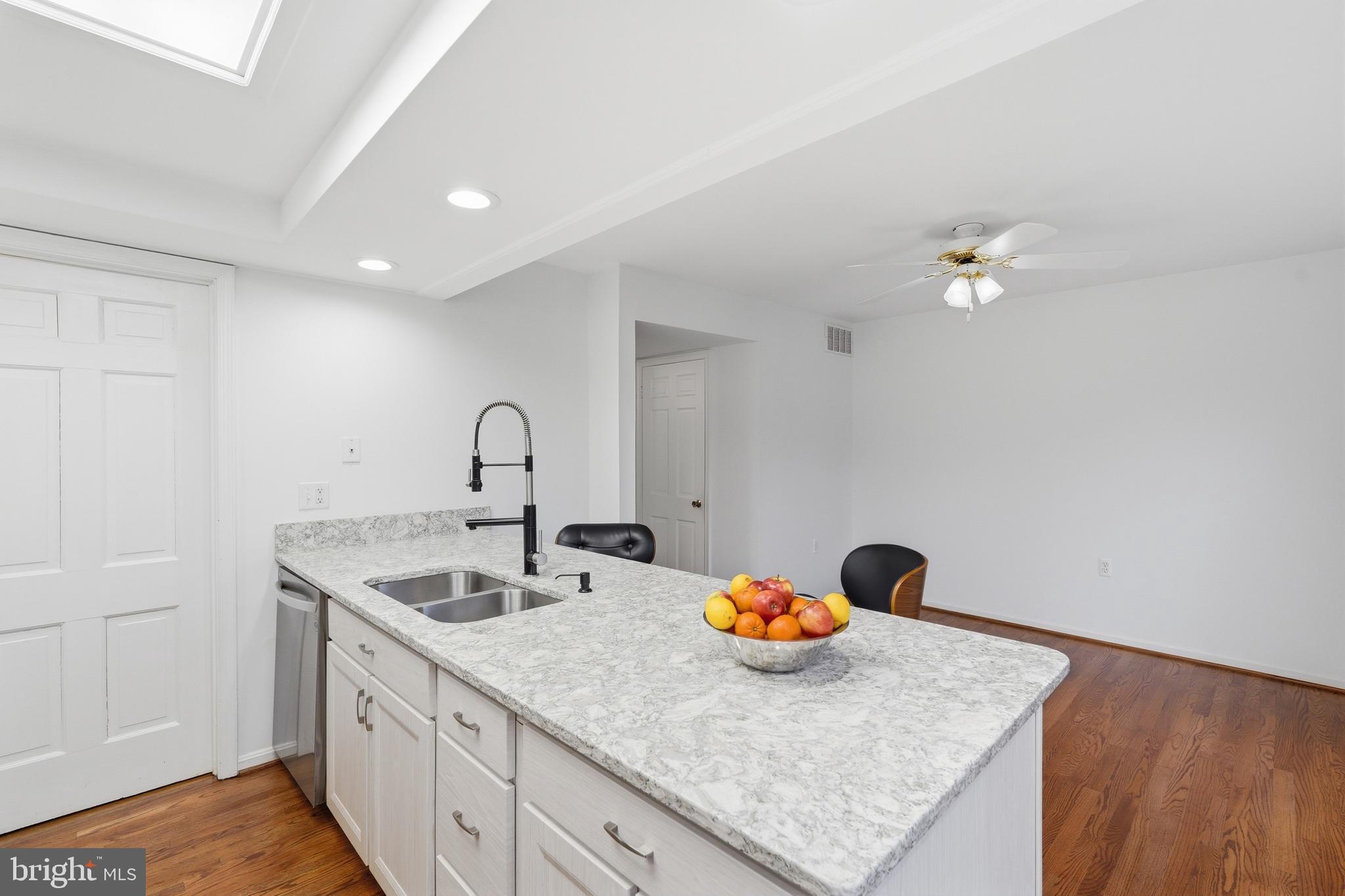 1734 Dana Street Crofton, MD 21114 - Photo 12 of 40 a kitchen with sink and dishwasher