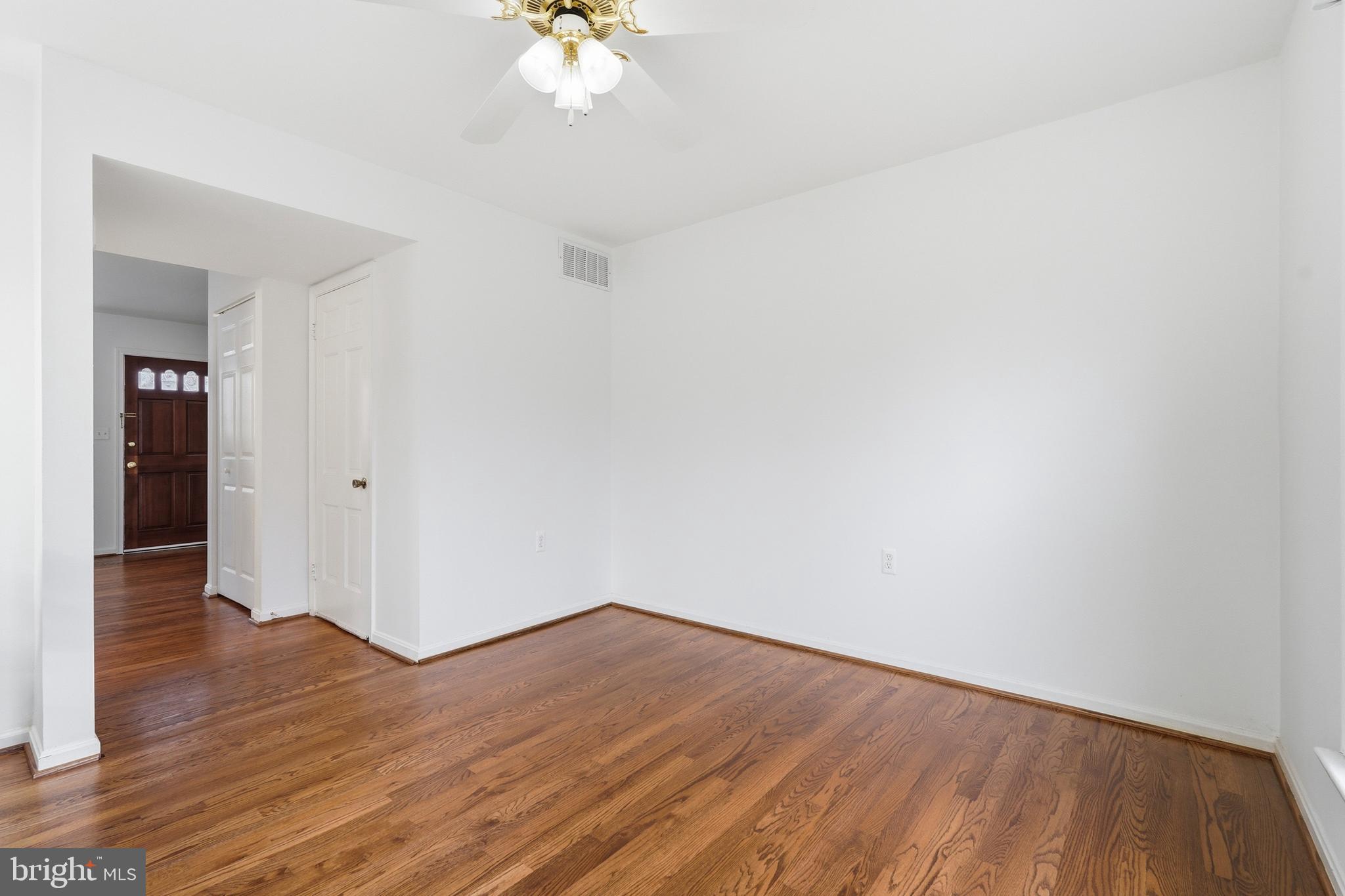 1734 Dana Street Crofton, MD 21114 - Photo 14 of 40 a view of an empty room with wooden floor