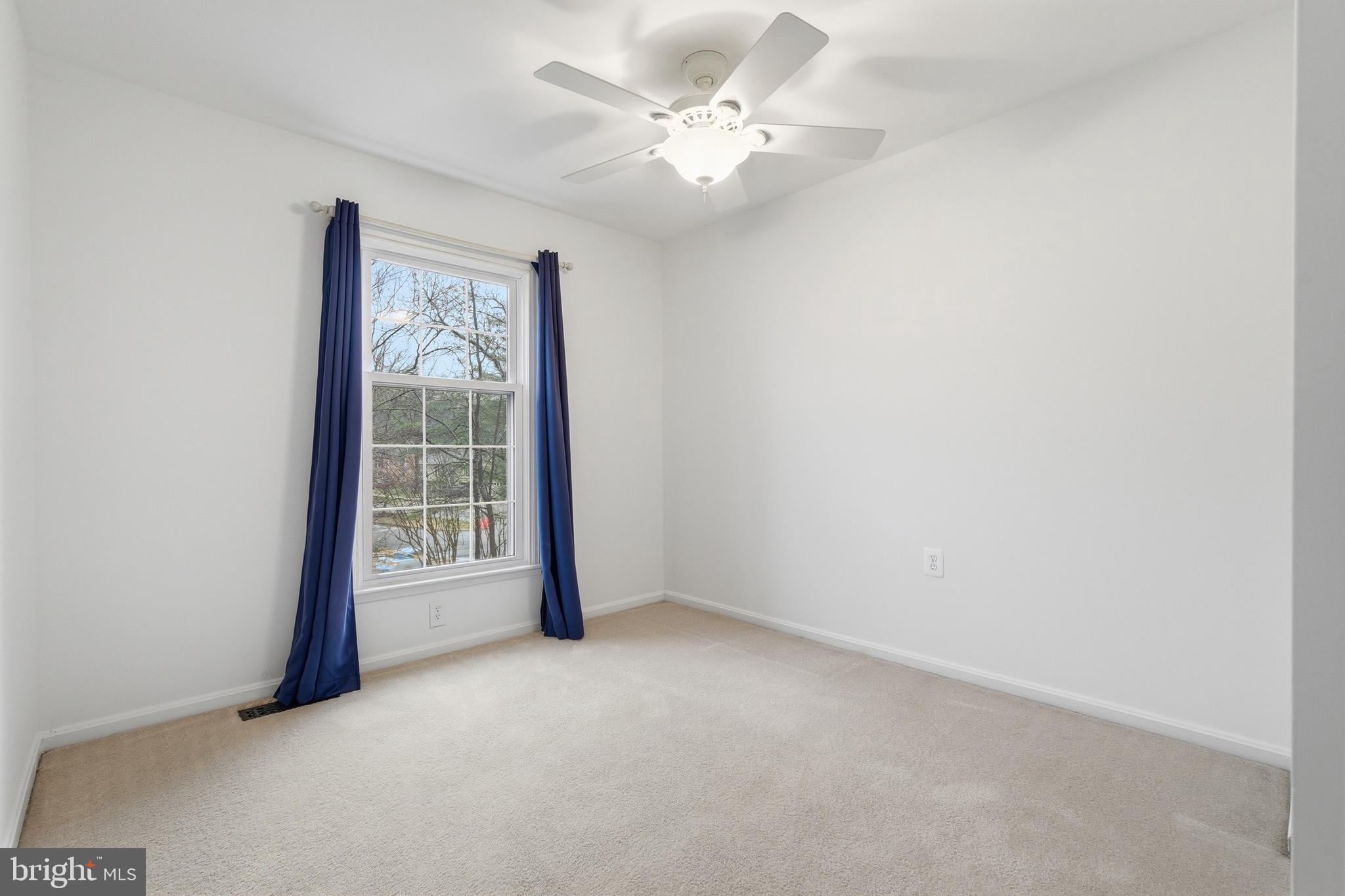1734 Dana Street Crofton, MD 21114 - Photo 22 of 40 an empty room with windows and fan