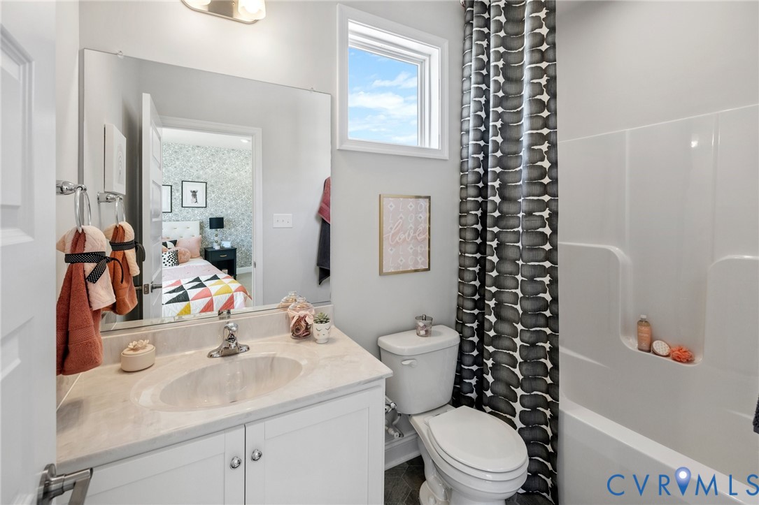 16120 Esteem Way Midlothian, VA 23113 - Photo 22 of 38 a bathroom with a sink mirror vanity and toilet