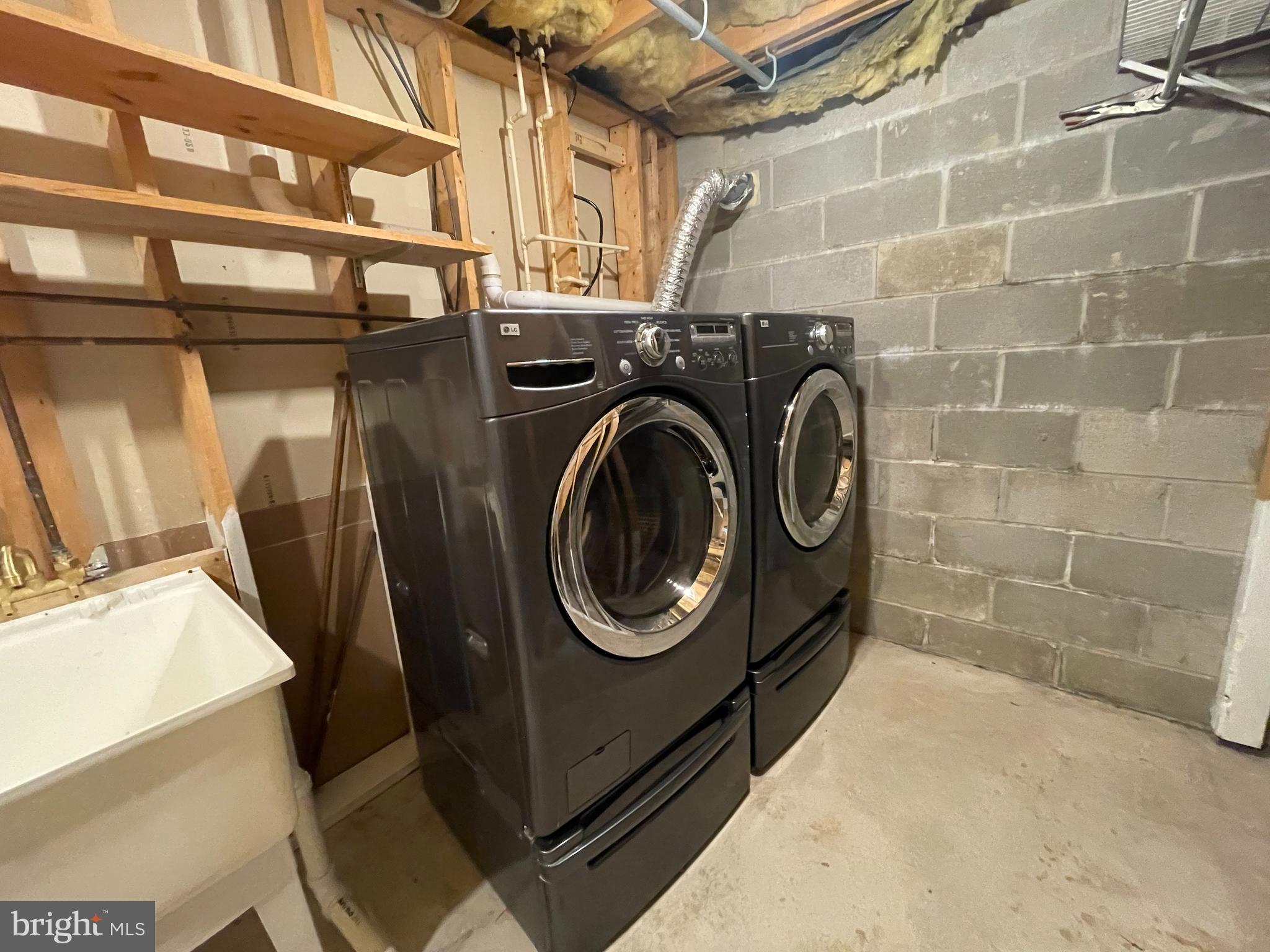 7944 Tick Neck Road Pasadena, MD 21122 - Photo 29 of 40 a utility room with dryer and washer