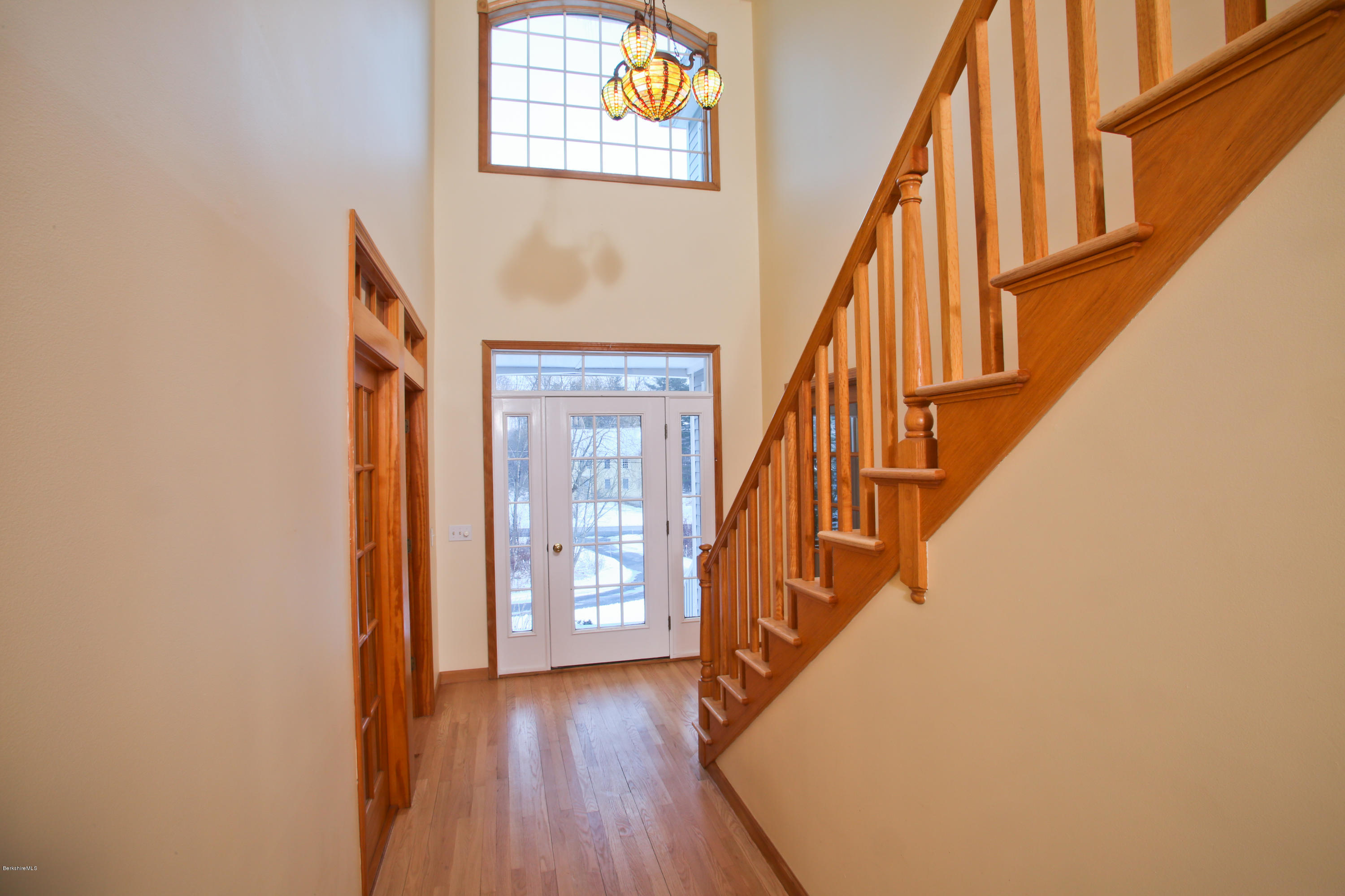 35 Under Mountain Road Lenox, MA 01240 - Photo 14 of 25 a view of staircase with wooden floor and white walls