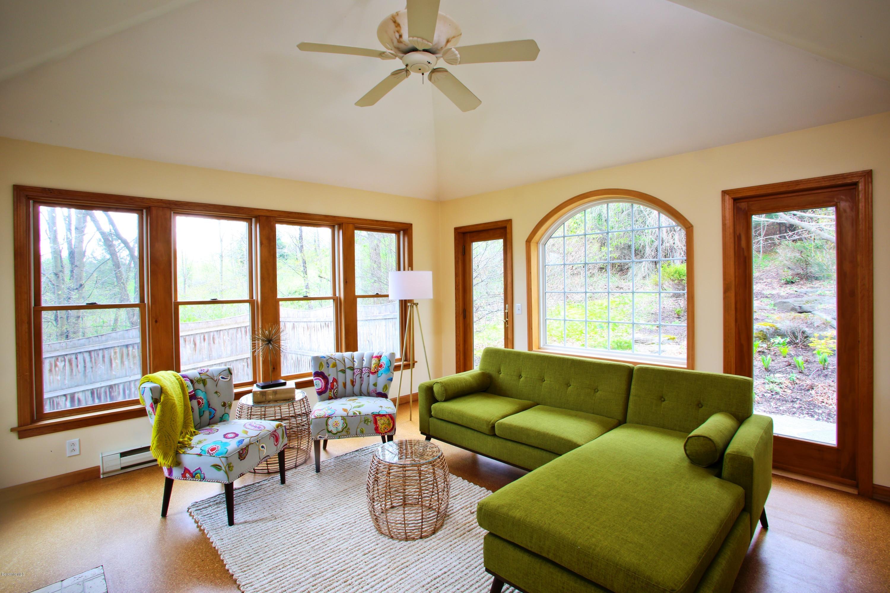 35 Under Mountain Road Lenox, MA 01240 - Photo 3 of 25 a living room with furniture and a large window