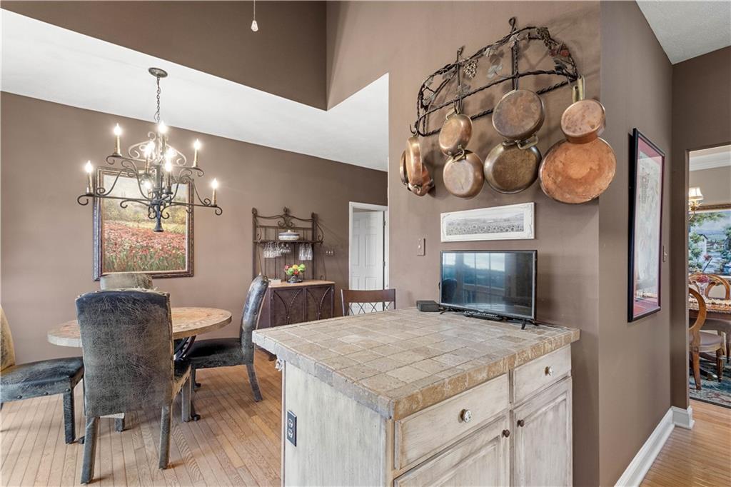 2408 Hilltop Road Presto, PA 15142 - Photo 11 of 42 a kitchen with a dining table and chairs