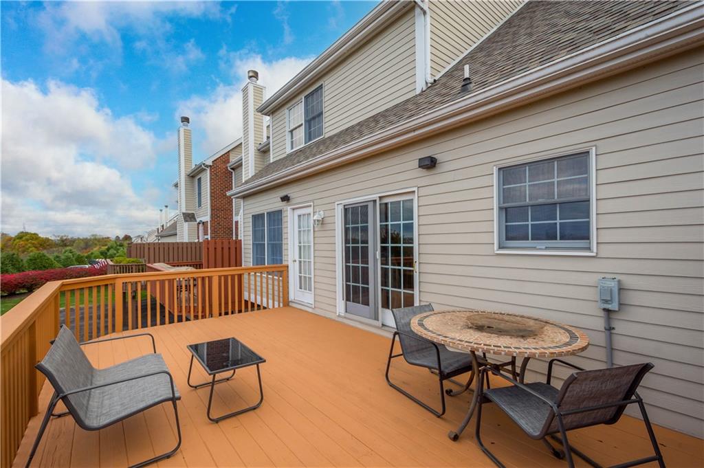 2408 Hilltop Road Presto, PA 15142 - Photo 15 of 42 a view of a patio with a table and chairs