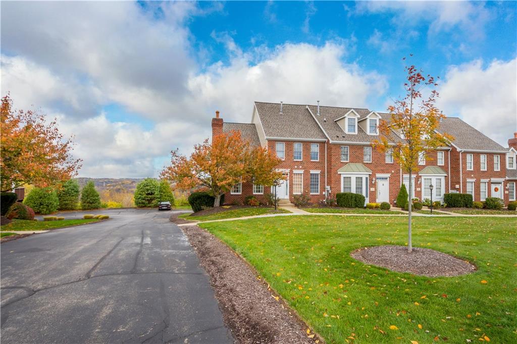 2408 Hilltop Road Presto, PA 15142 - Photo 2 of 42 a view of a big building in a big yard with large trees