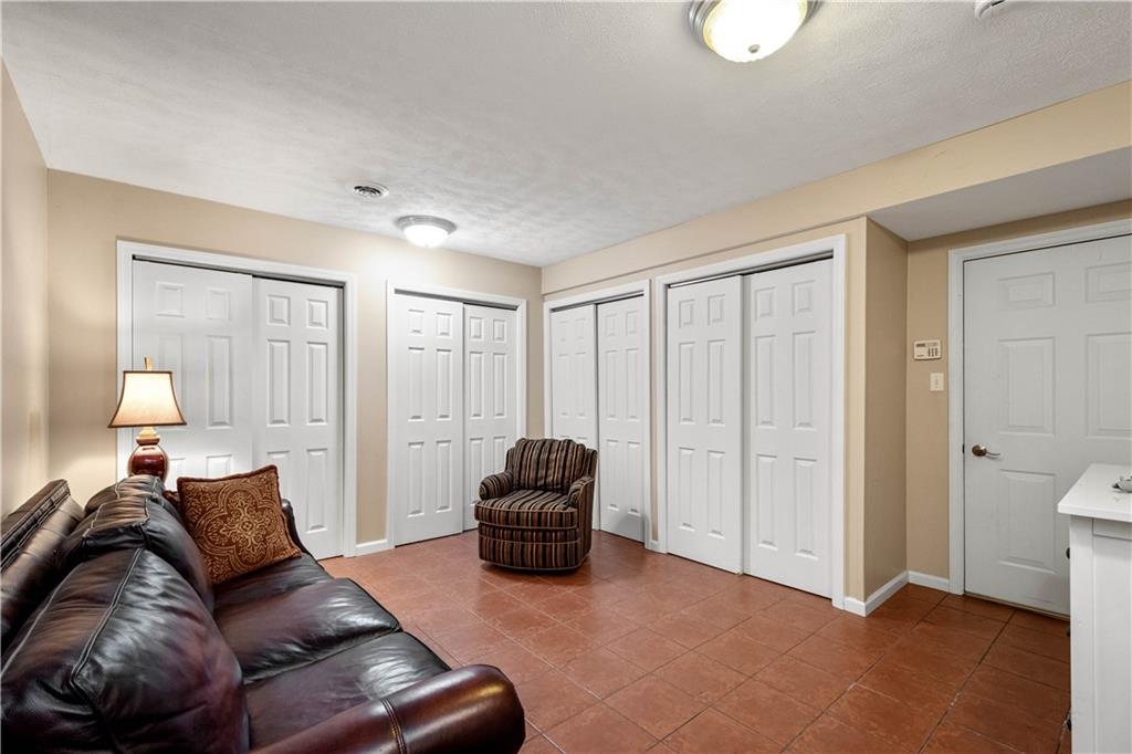 2408 Hilltop Road Presto, PA 15142 - Photo 35 of 42 a living room with furniture and a lamp