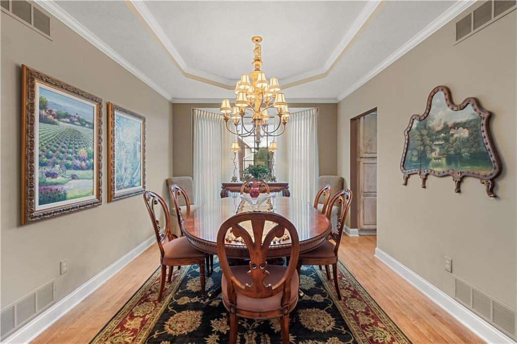 2408 Hilltop Road Presto, PA 15142 - Photo 6 of 42 a view of a dining room with furniture window and wooden floor