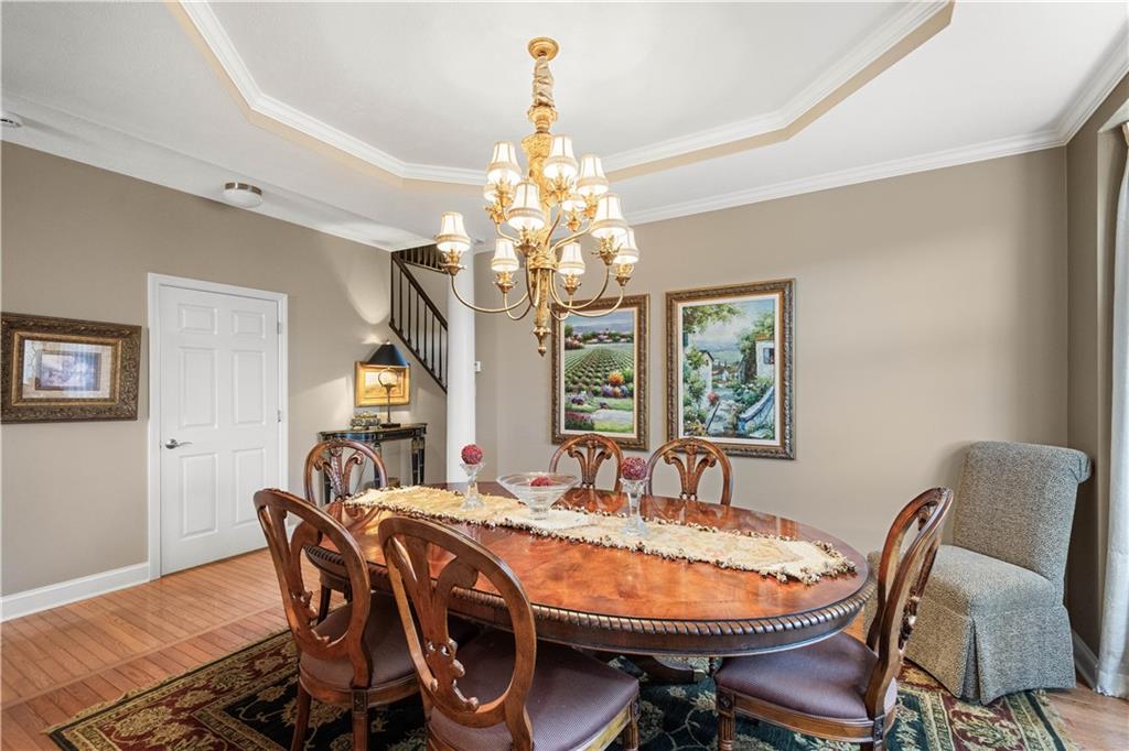 2408 Hilltop Road Presto, PA 15142 - Photo 7 of 42 a dining room with furniture a chandelier and window