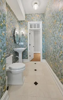 a utility room with cabinets dryer and washer