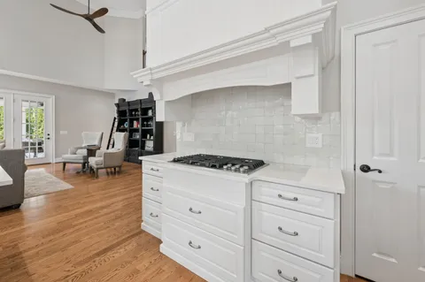 a spacious bedroom with a bed and a window