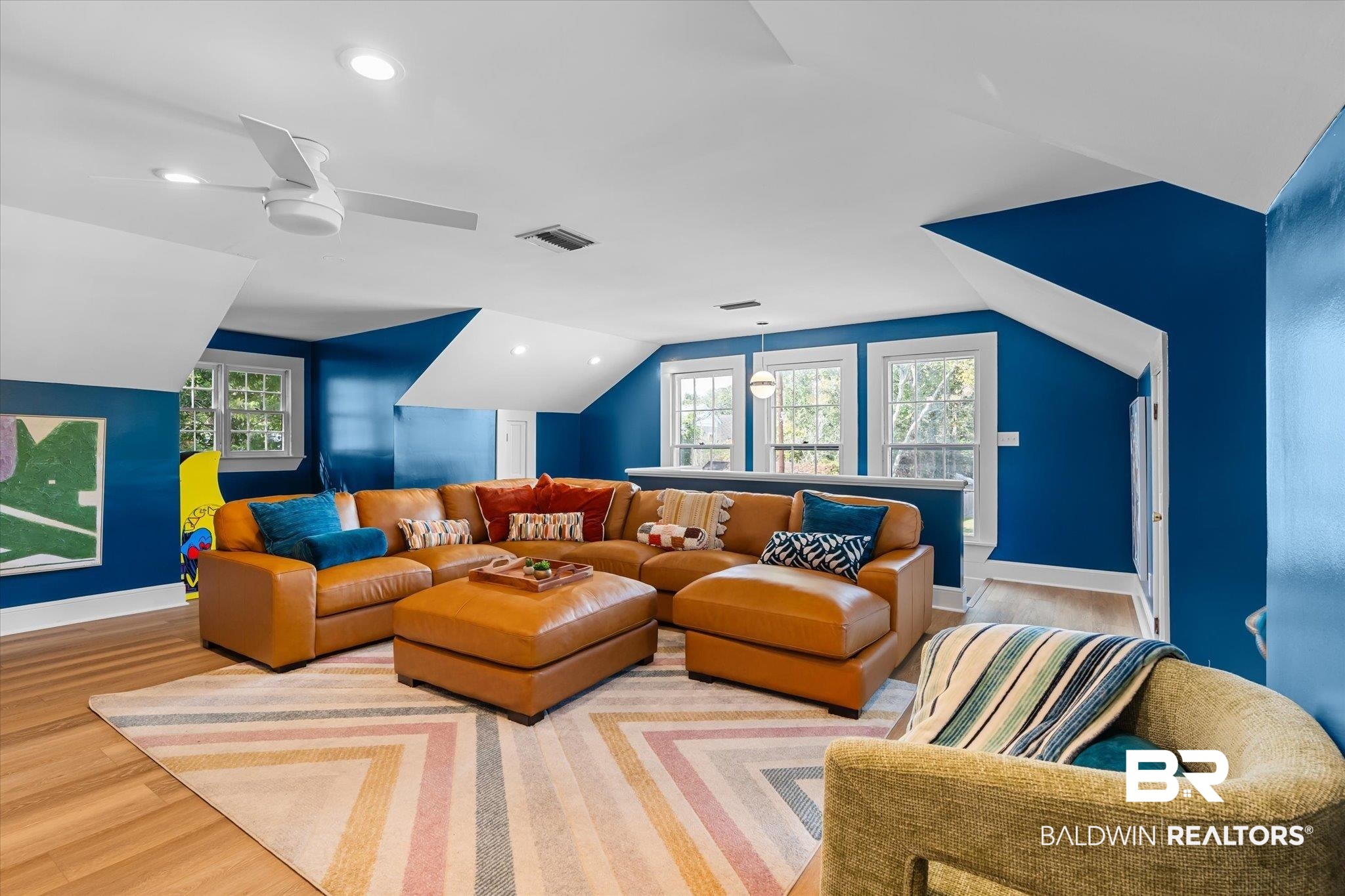 1210 Government Street Mobile, AL 36604 - Photo 17 of 37 Home theater room with light hardwood / wood-style floors, ceiling fan, and vaulted ceiling