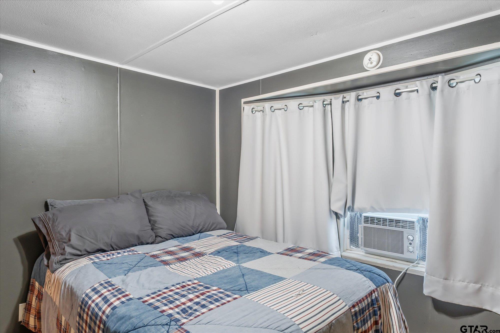 338 Bandera Bullard, TX 75757 - Photo 15 of 26 a bedroom with a bed and a window