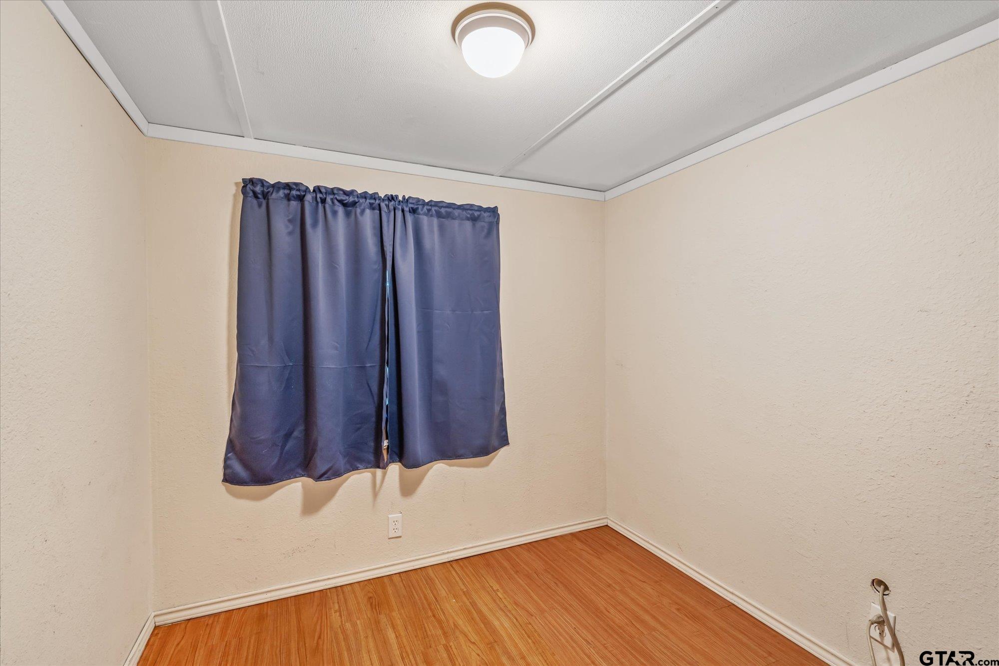 338 Bandera Bullard, TX 75757 - Photo 17 of 26 a room with a window and a potted plant