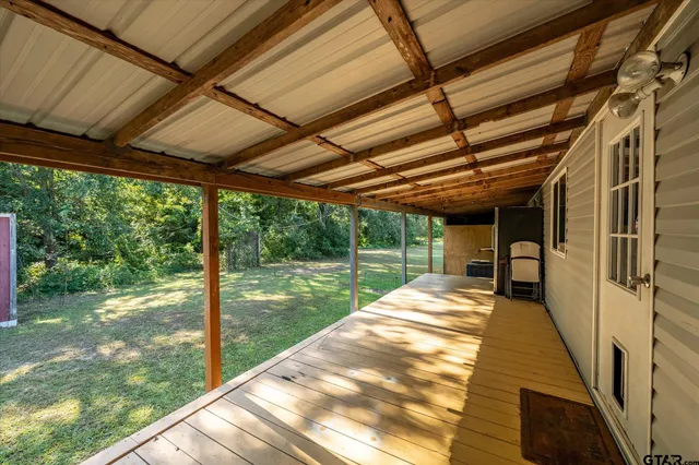 a view of swimming pool with a backyard