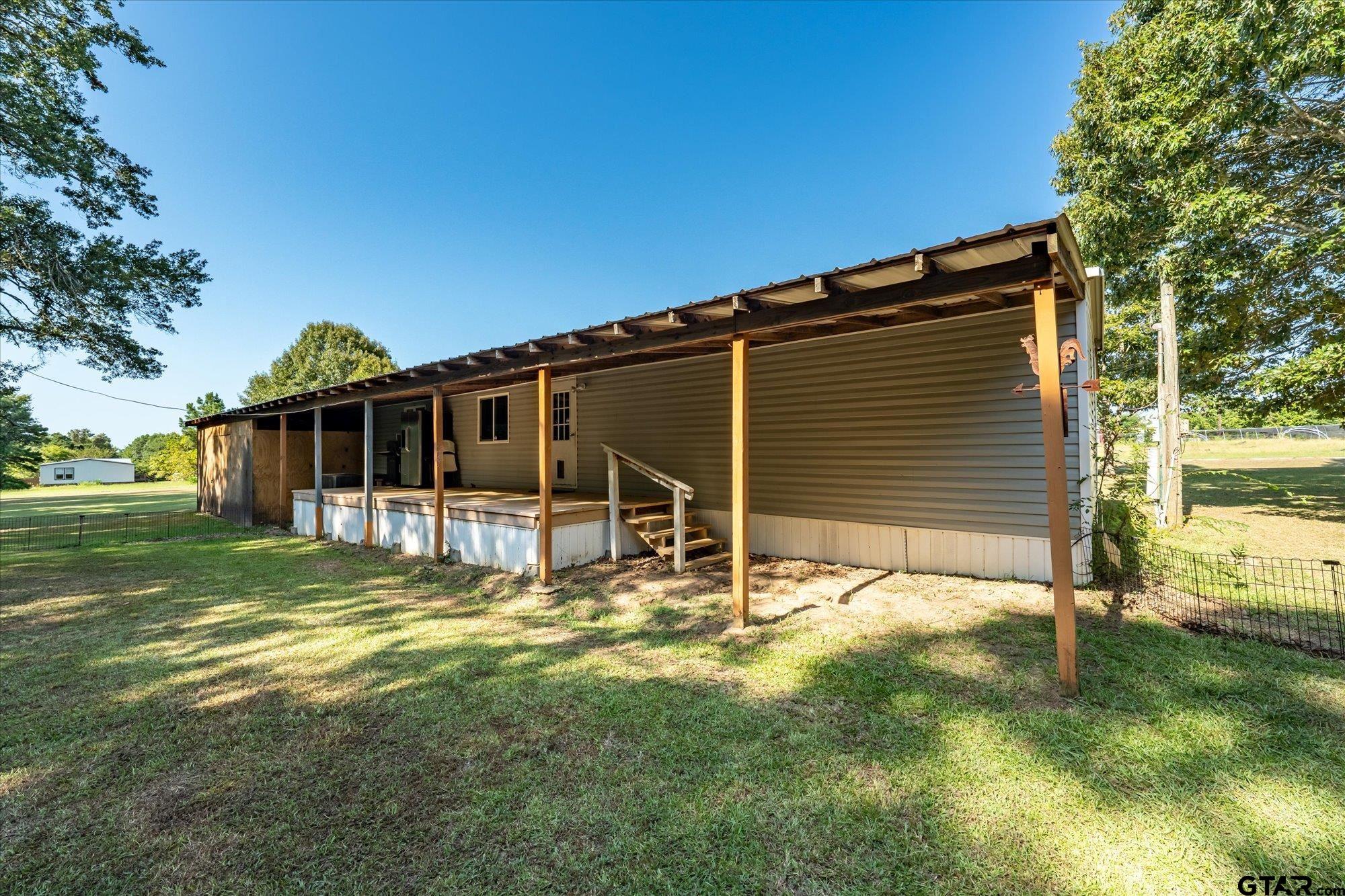 338 Bandera Bullard, TX 75757 - Photo 19 of 26 a backyard of a house with table and chairs