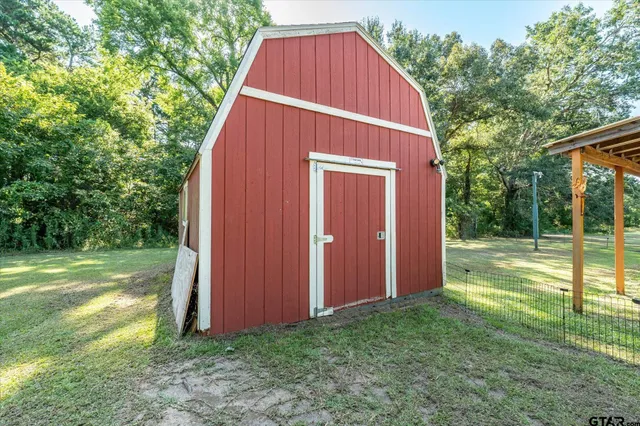 a view of backyard with green space