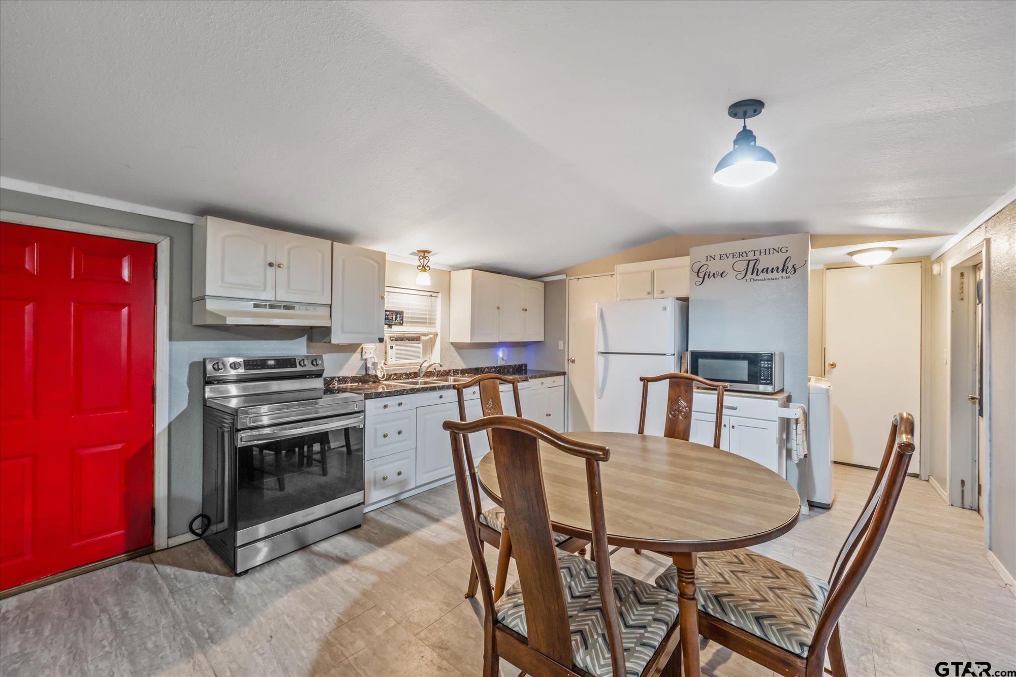 338 Bandera Bullard, TX 75757 - Photo 6 of 26 a view of kitchen with cabinets table and chairs