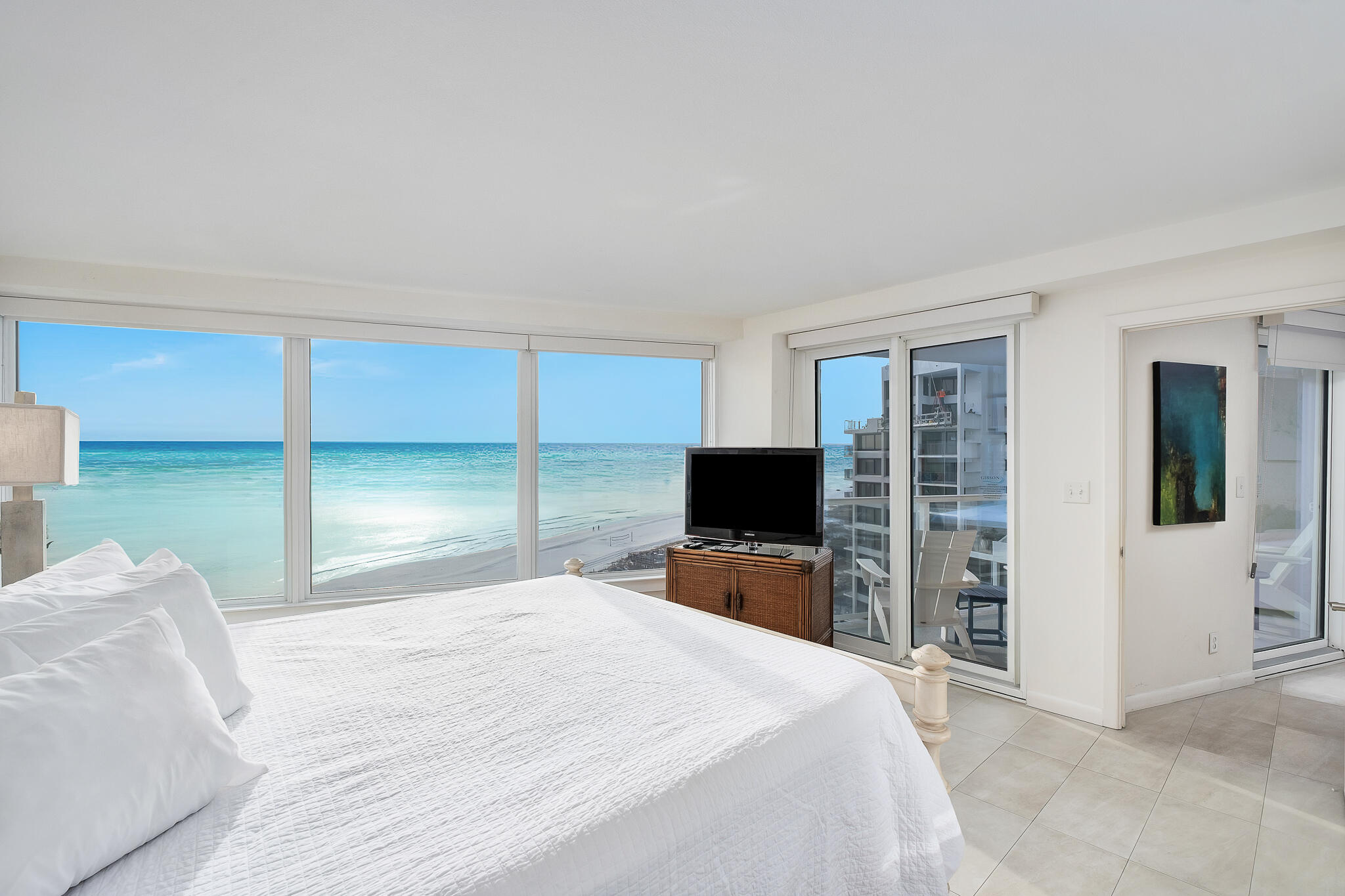 4291 Beachside 2, Unit 4291 Miramar Beach, FL 32550 - Photo 16 of 55 a bedroom with a bed and a flat screen tv