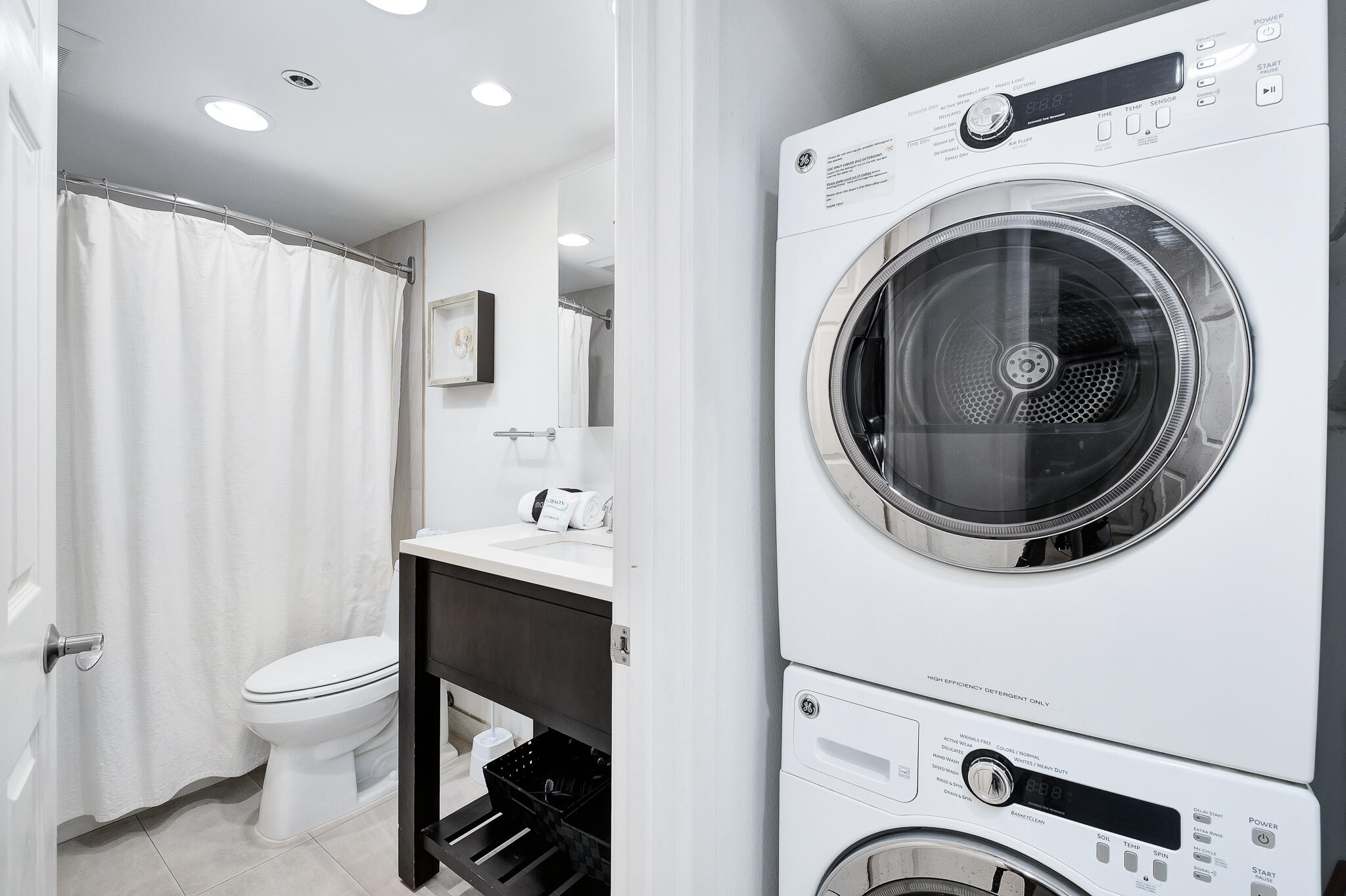 4291 Beachside 2, Unit 4291 Miramar Beach, FL 32550 - Photo 19 of 55 a bathroom with a sink a toilet and a mirror