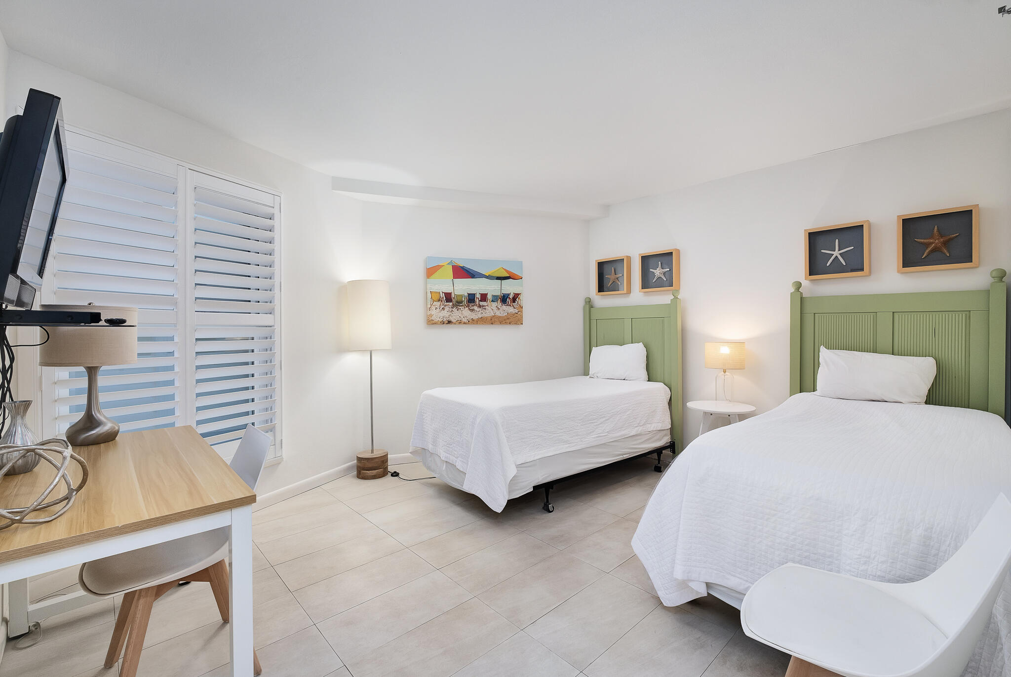 4291 Beachside 2, Unit 4291 Miramar Beach, FL 32550 - Photo 21 of 55 a bedroom with a bed and a chair