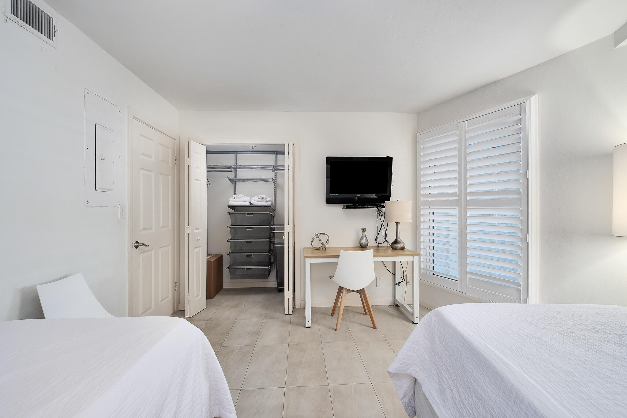 4291 Beachside 2, Unit 4291 Miramar Beach, FL 32550 - Photo 22 of 55 a bedroom with a bed and a flat screen tv