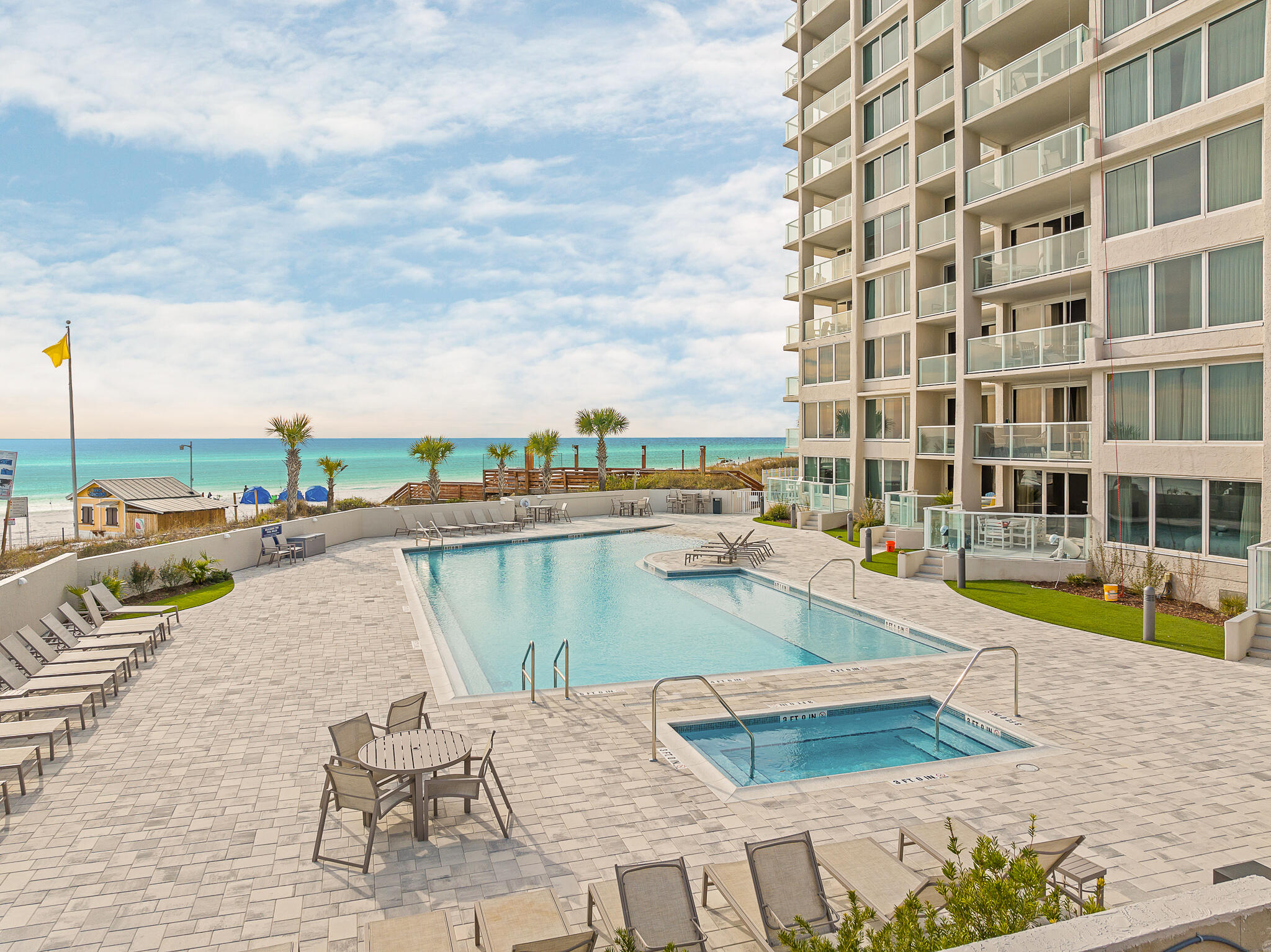 4291 Beachside 2, Unit 4291 Miramar Beach, FL 32550 - Photo 31 of 55 a view of swimming pool with outdoor seating and city view