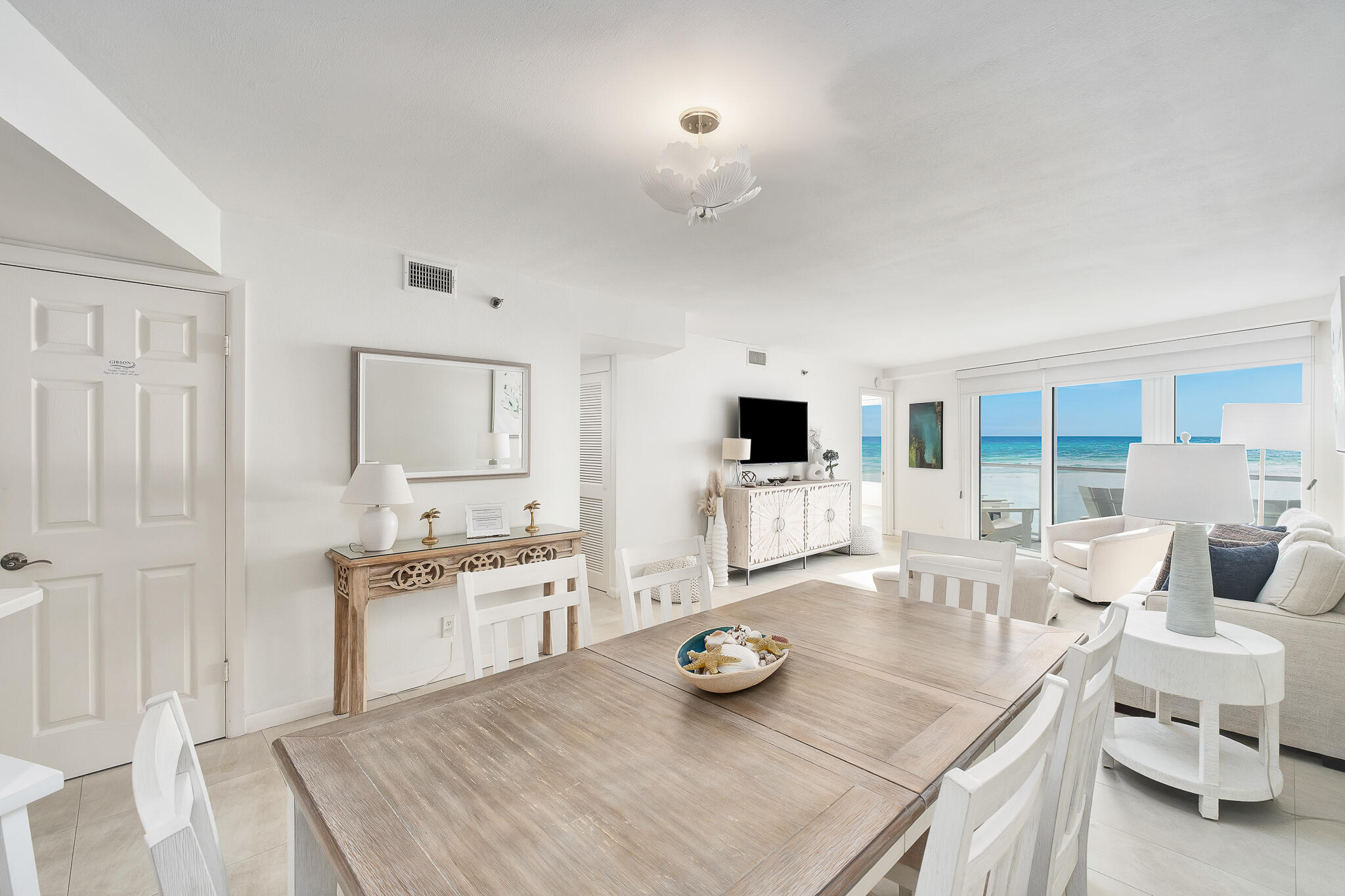 4291 Beachside 2, Unit 4291 Miramar Beach, FL 32550 - Photo 6 of 55 a living room with furniture and view of kitchen