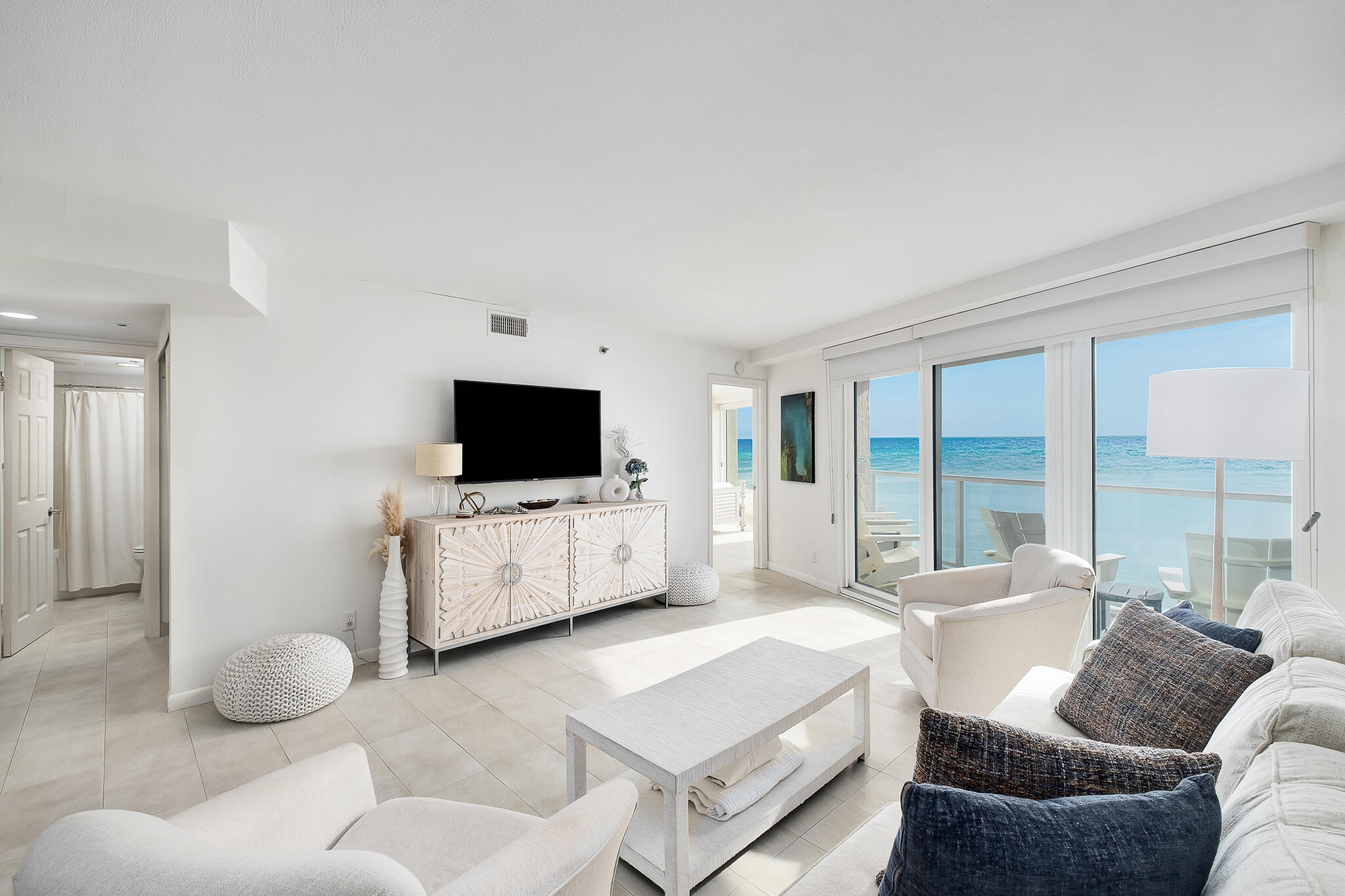 4291 Beachside 2, Unit 4291 Miramar Beach, FL 32550 - Photo 9 of 55 a living room with furniture and a flat screen tv