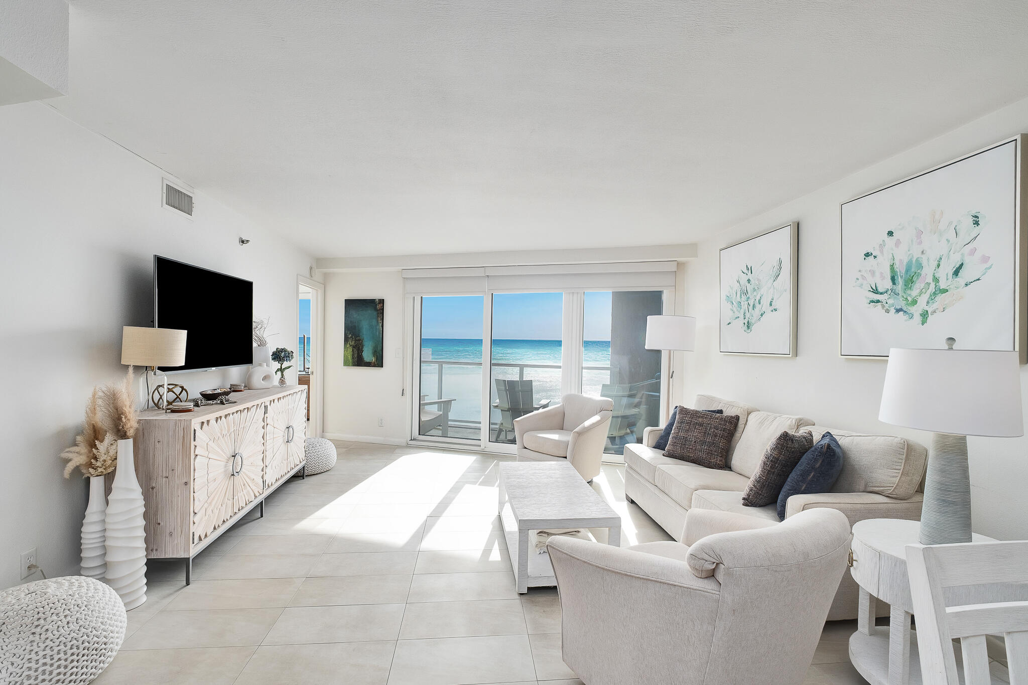 4291 Beachside 2, Unit 4291 Miramar Beach, FL 32550 - Photo 10 of 55 a living room with furniture and a flat screen tv