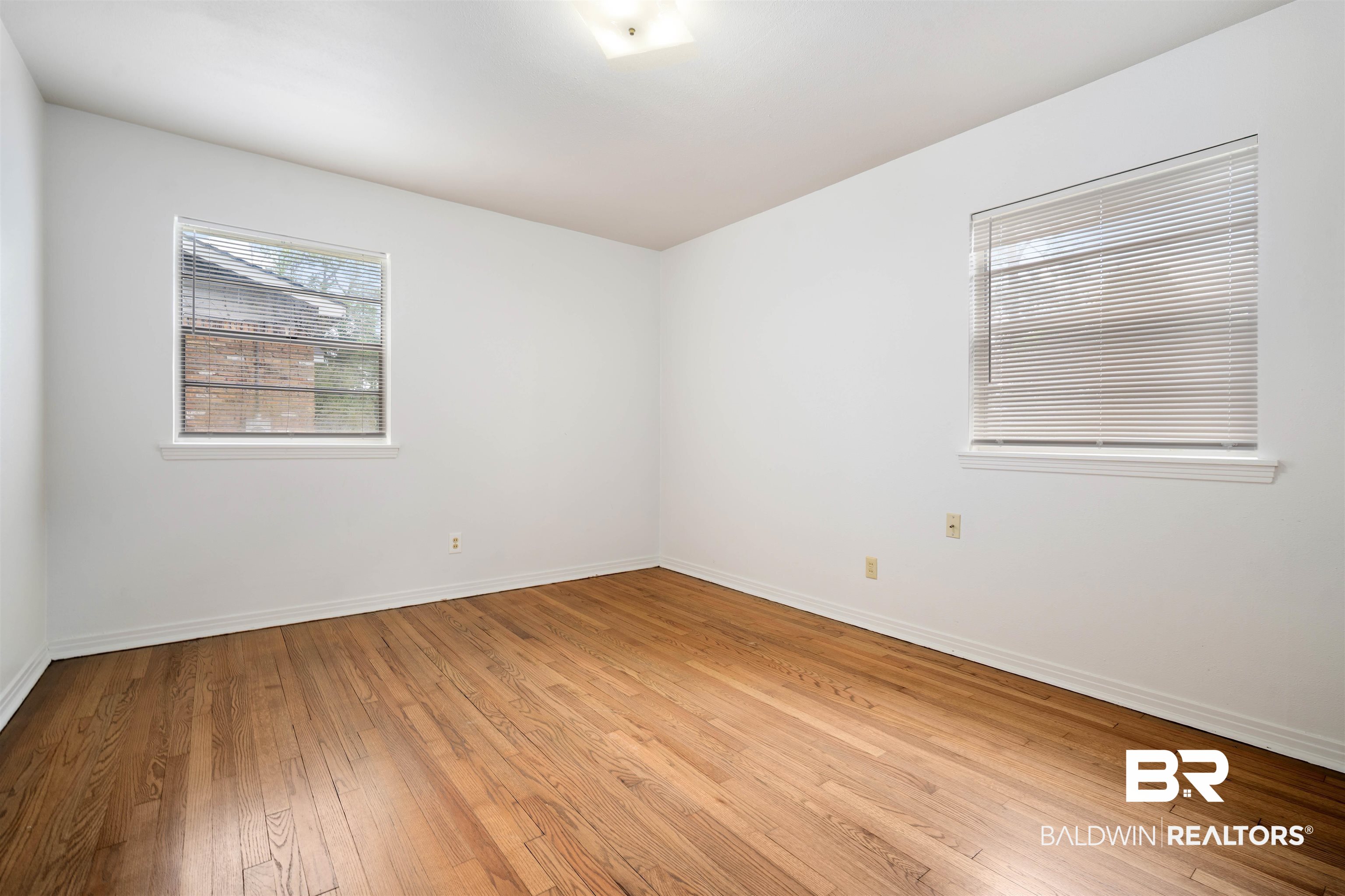 570 Markham Drive Mobile, AL 36609 - Photo 20 of 25 Unfurnished room with light wood finished floors and baseboards