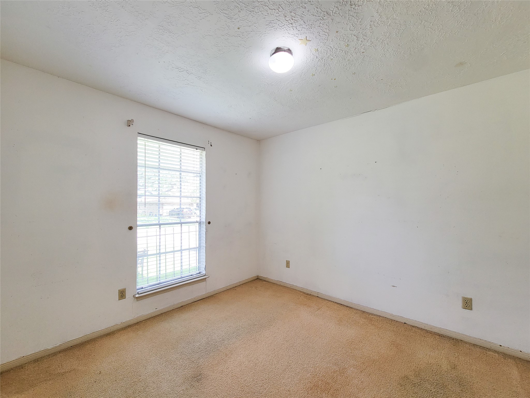 23211 Timberbrook Drive Spring, TX 77373 - Photo 19 of 34 an empty room with windows