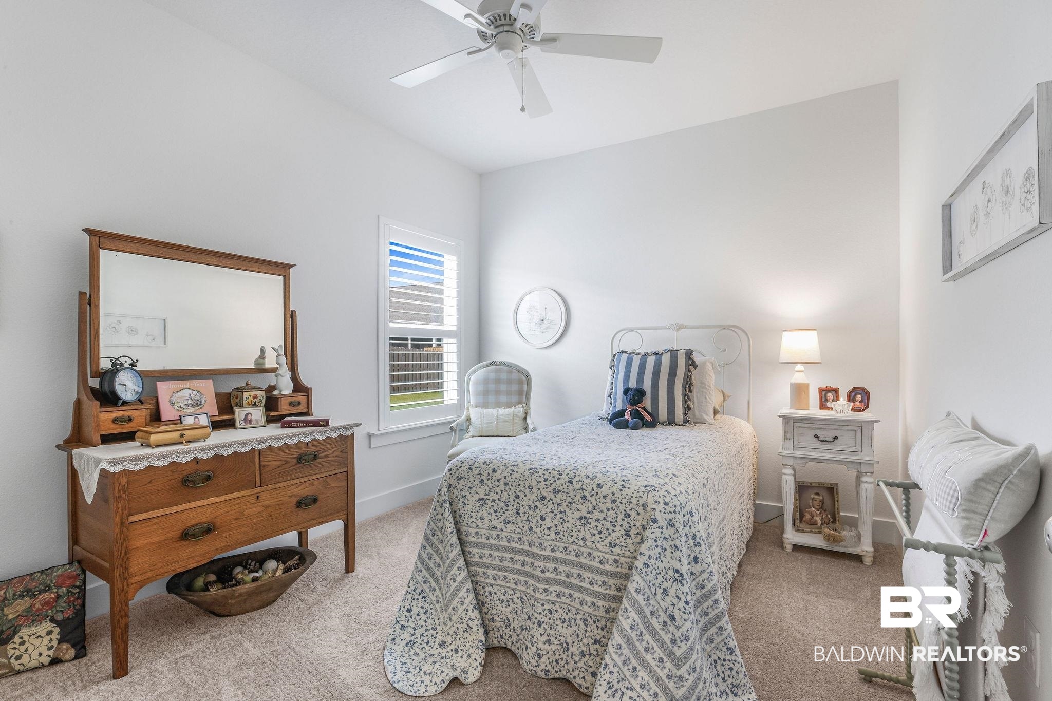9901 Weller Cove Foley, AL 36535 - Photo 22 of 23 Bedroom featuring light colored carpet and a ceiling fan