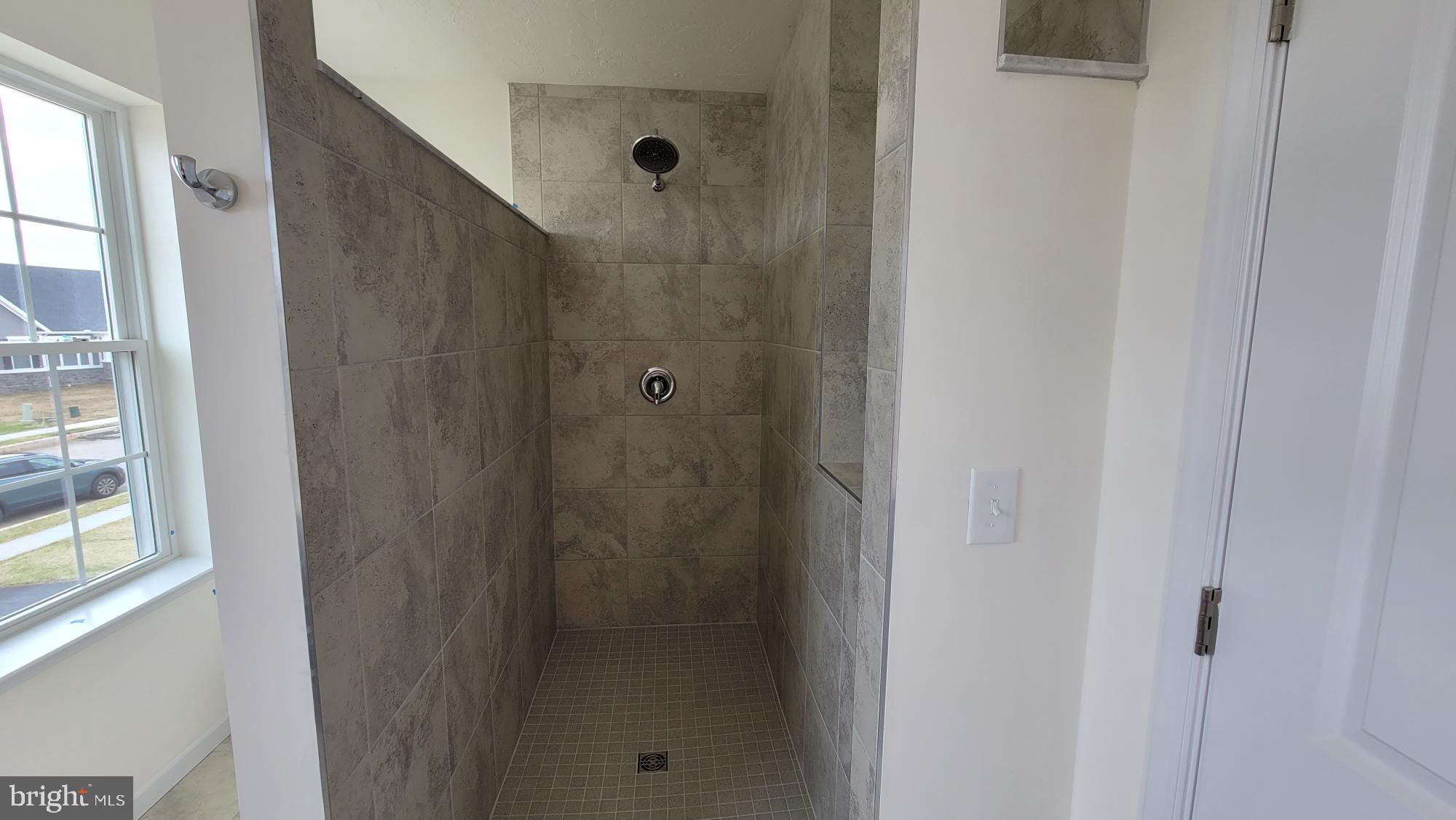 105 Piedmont Way, Unit 104 Hanover, PA 17331 - Photo 19 of 22 a bathroom with a shower