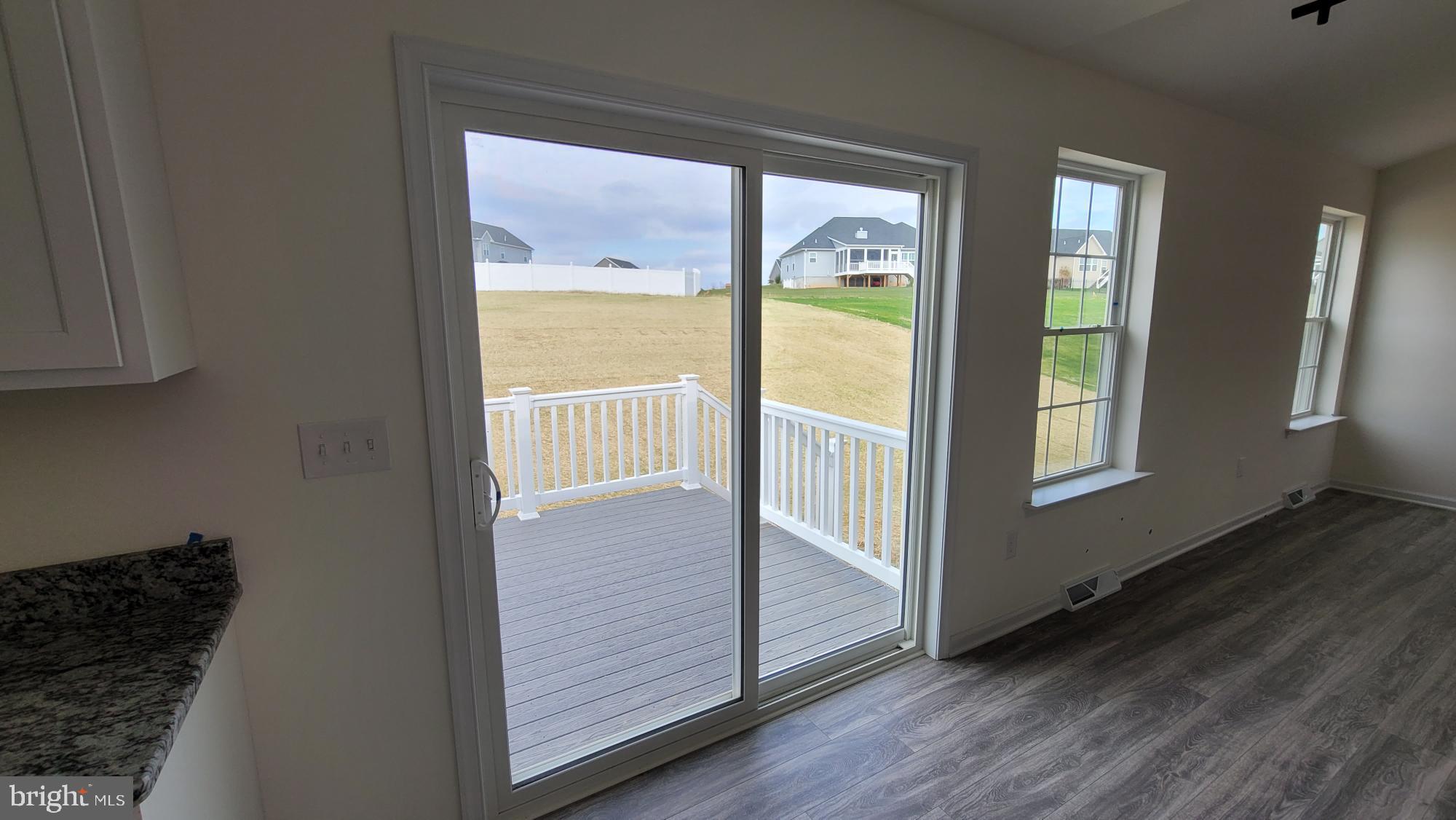 105 Piedmont Way, Unit 104 Hanover, PA 17331 - Photo 7 of 22 a view of front door with wooden floor