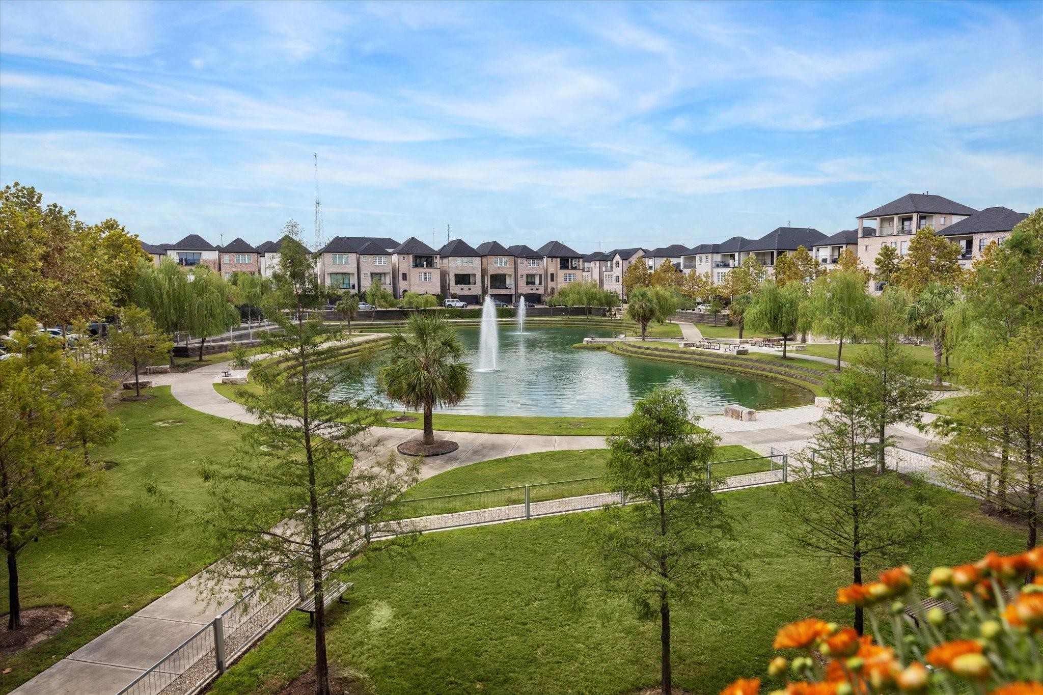2613 Maxroy Street Houston, TX 77007 - Photo 2 of 43 Cottage Grove Lake residents enjoy an extensively landscaped community (included in HOA) with stunning lake views, walking trails, lots of green space, a dog park, & a gorgeous community pool