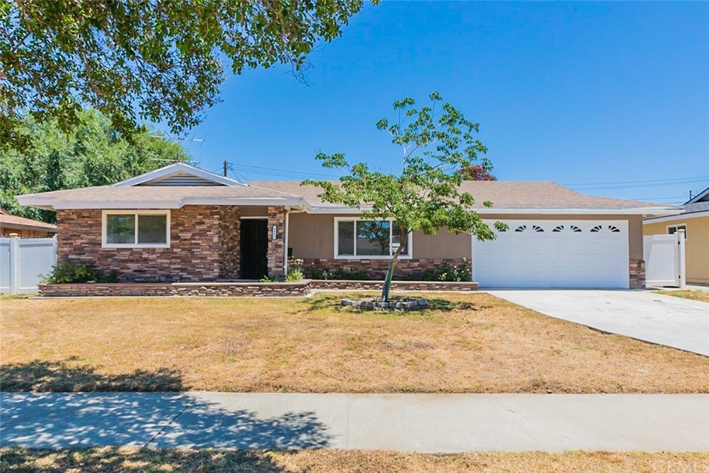 4453 Elora Court Riverside, CA 92503 - Photo 1 of 1 a house view with a sitting space and wooden fence